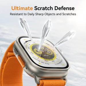 Ceramic glass resisting sharp objects on an Apple Watch Ultra with an orange Alpine Loop band in the snow